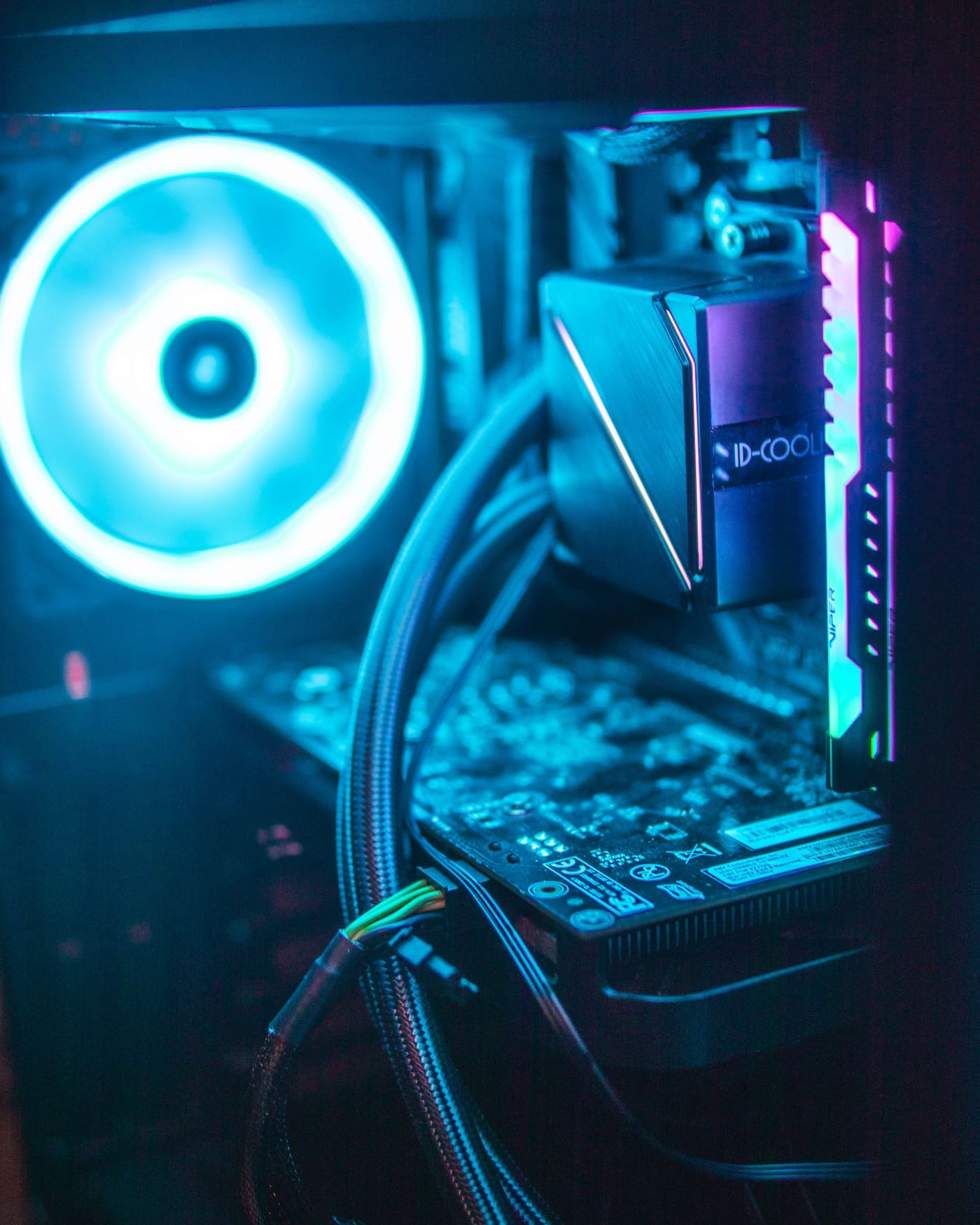 Open PC case mid-build, cooler and RGB memory visible
